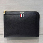 톰 브라운 클러치백 210713